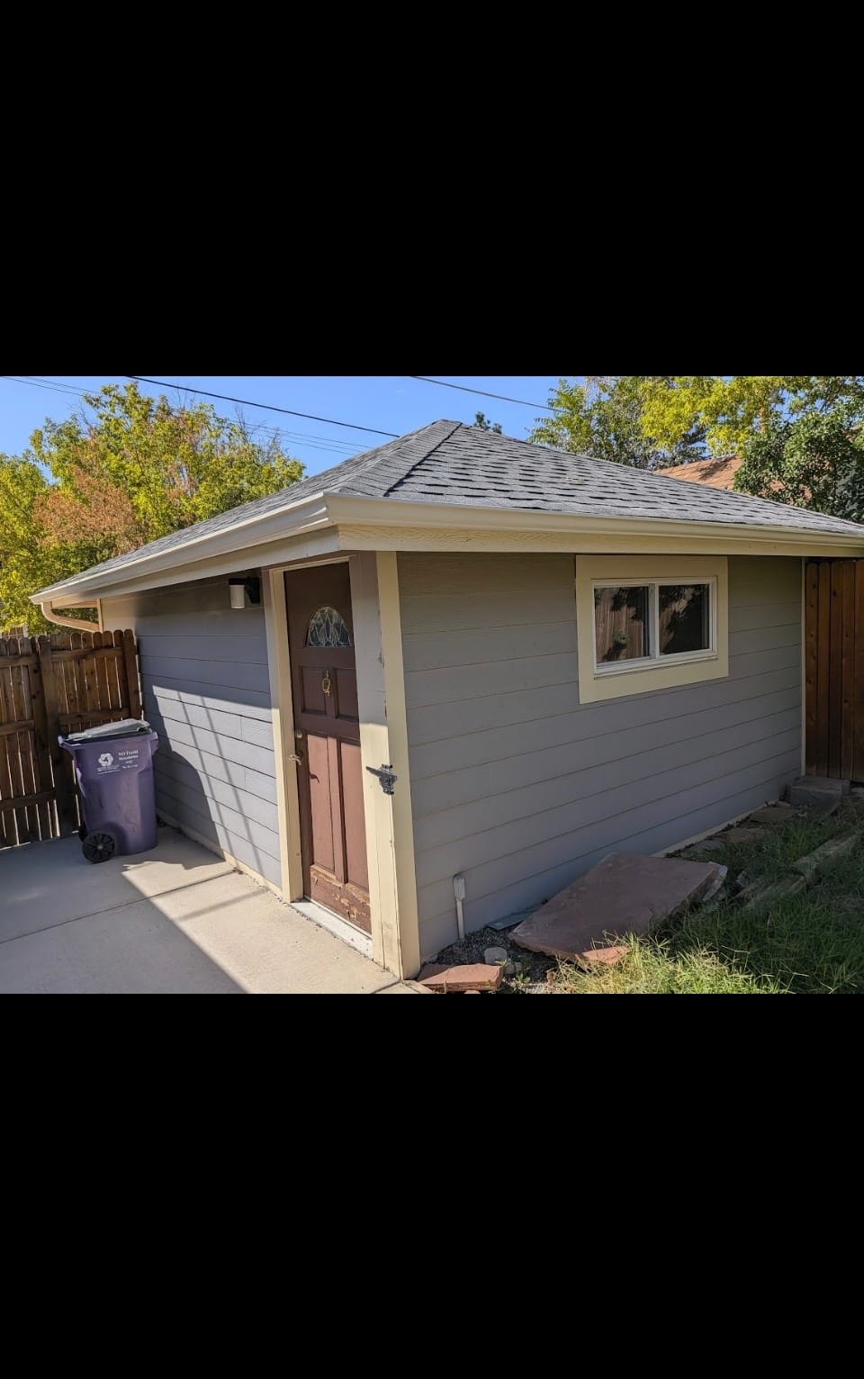 Backyard shed before demolition and removal by JK Hauling & Demo in Denver Colorado
